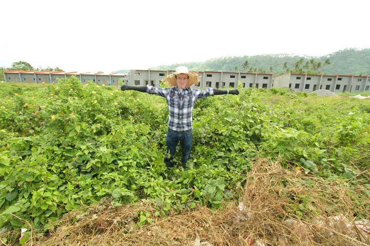 Stephen posing as a scarecrow at the Habitat for Humanity build site