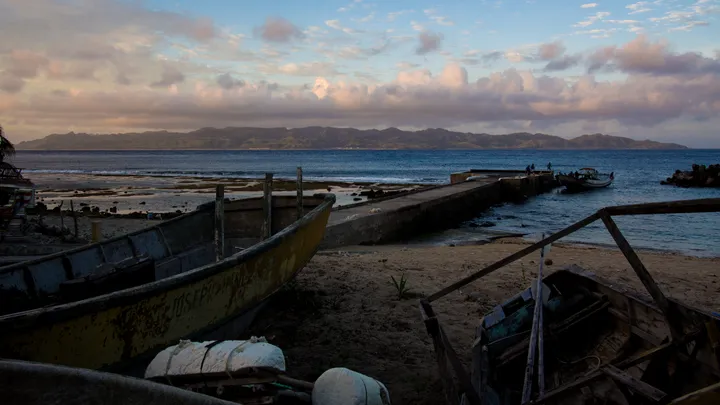 Weathered fishing boats at the Sabtang harbor at dawn